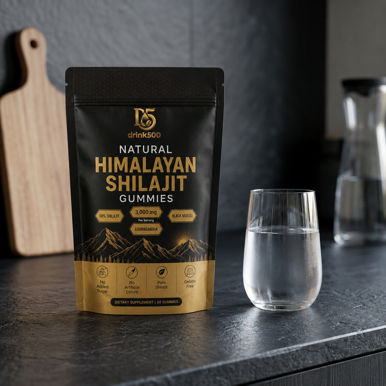 Drink500 Shilajit Gummies pouch on a kitchen counter with a glass of water